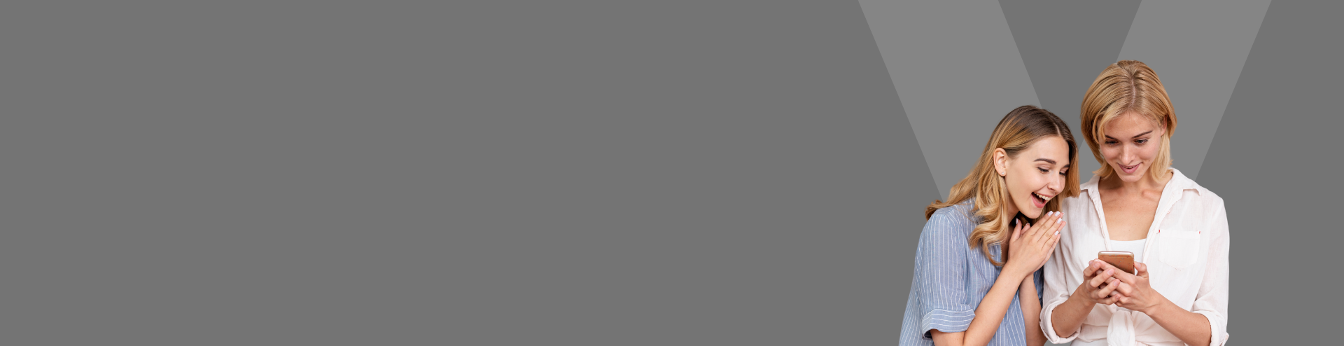 Two women looking at phone